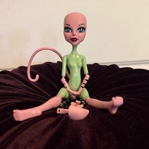 monster high pink and green doll with tail
